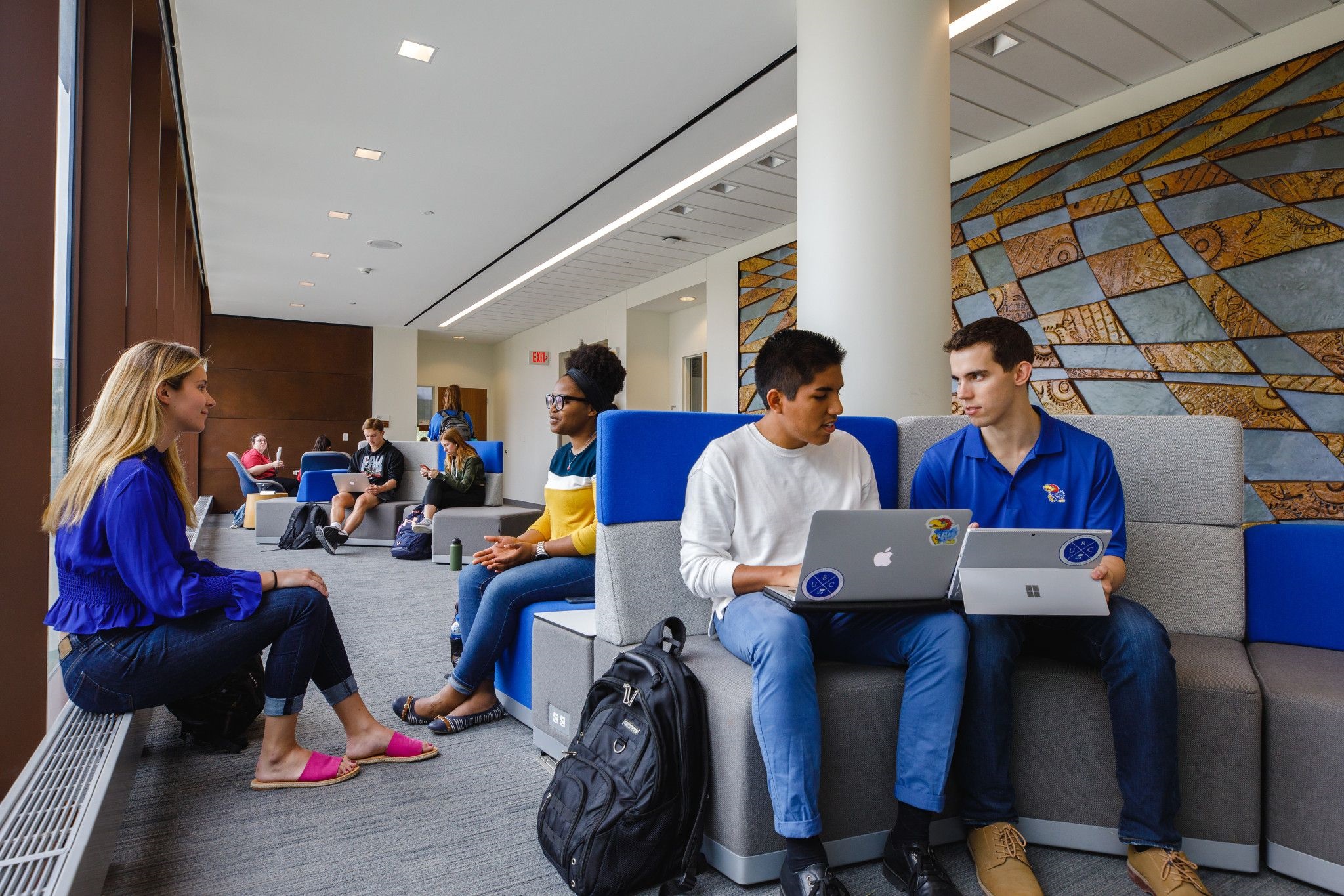 Students sitting in collaborative area